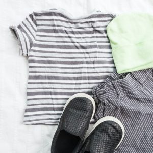 Baby boy clothes on white background